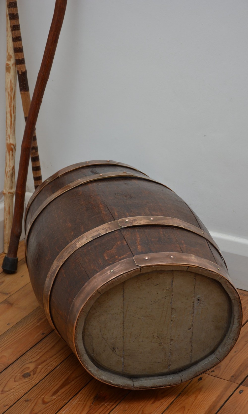 A Victorian dark oak coopered barrel umbrella stand with polished metal binding hoops. View XII