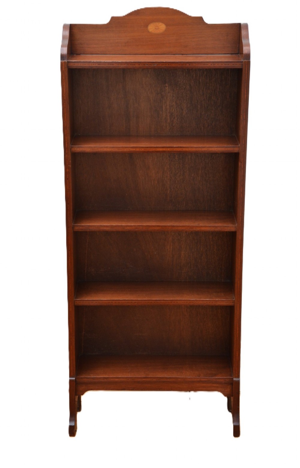 A slim Edwardian mahogany open bookcase featuring four shelves, an inlaid oval motif on the shaped gallery top, and bracket feet. View II