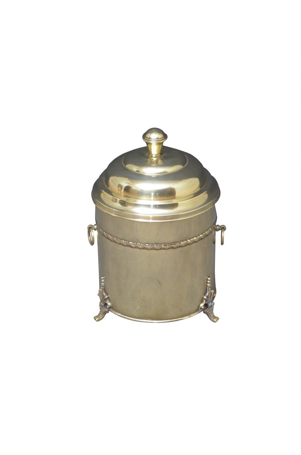 An Edwardian cylindrical polished brass coal bucket featuring a domed lid with a top finial, rope-twist trim around the neck, drop-ring side handles, and decorative feet.