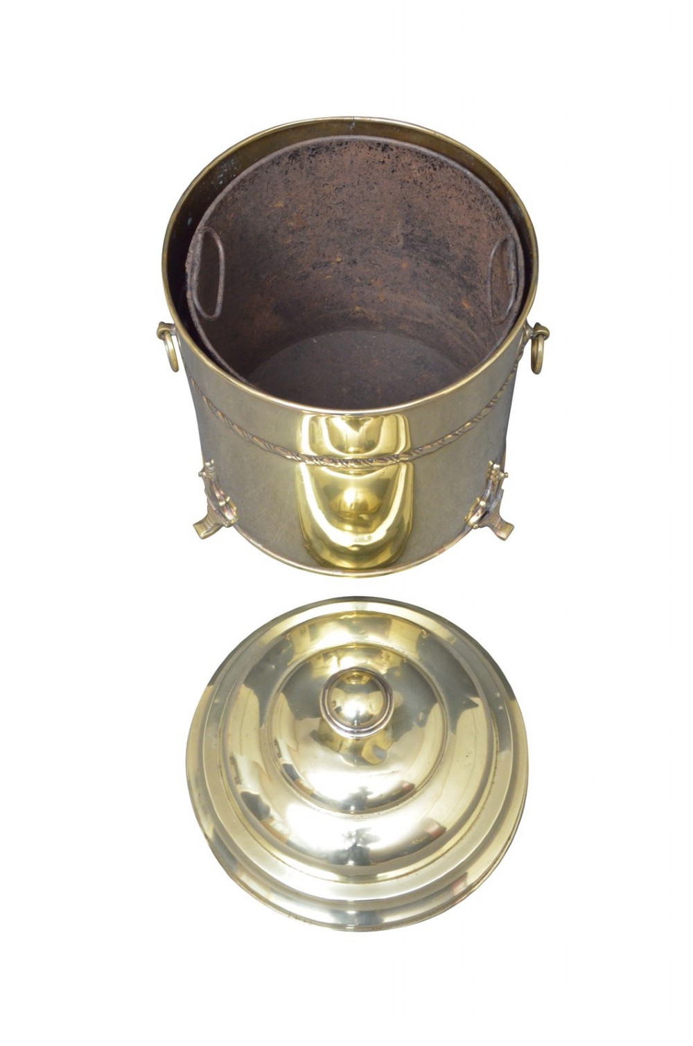 An Edwardian cylindrical polished brass coal bucket featuring a domed lid with a top finial, rope-twist trim around the neck, drop-ring side handles, and decorative feet. View II
