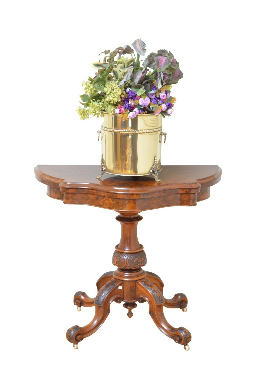 An Edwardian cylindrical polished brass coal bucket featuring a domed lid with a top finial, rope-twist trim around the neck, drop-ring side handles, and decorative feet. View IV