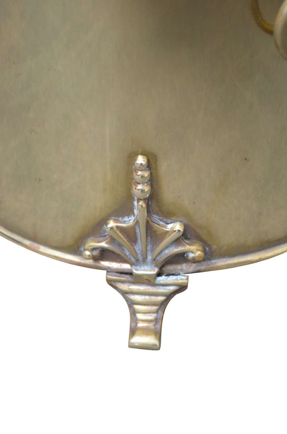 An Edwardian cylindrical polished brass coal bucket featuring a domed lid with a top finial, rope-twist trim around the neck, drop-ring side handles, and decorative feet. View V