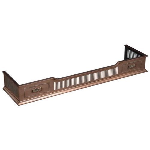 An antique Victorian copper fireplace fender featuring pierced vertical slots and side panels embellished with raised floral paterae and beaded edging.