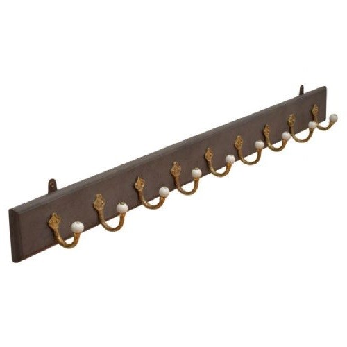 A long dark timber wall-mounted coat rack featuring multiple cast brass hooks with white ceramic finials. View XIV