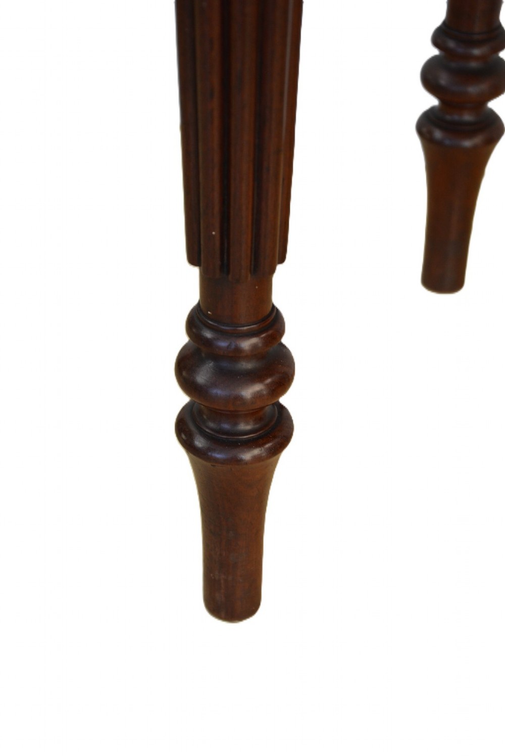 A dark mahogany bedside cabinet featuring a three-sided gallery top, a single door with a turned wooden knob, and four slender reeded legs. View XIII