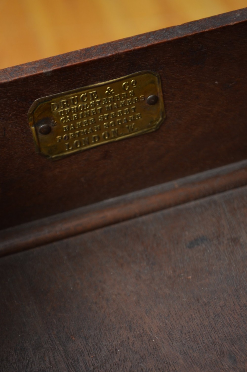 A Victorian mahogany hall table featuring a gallery back upstand, a single frieze drawer, and four turned legs. View VI