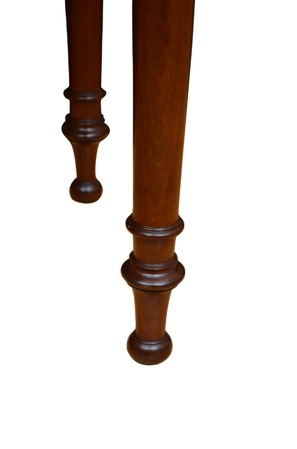 A Victorian mahogany hall table featuring a gallery back upstand, a single frieze drawer, and four turned legs. View IX