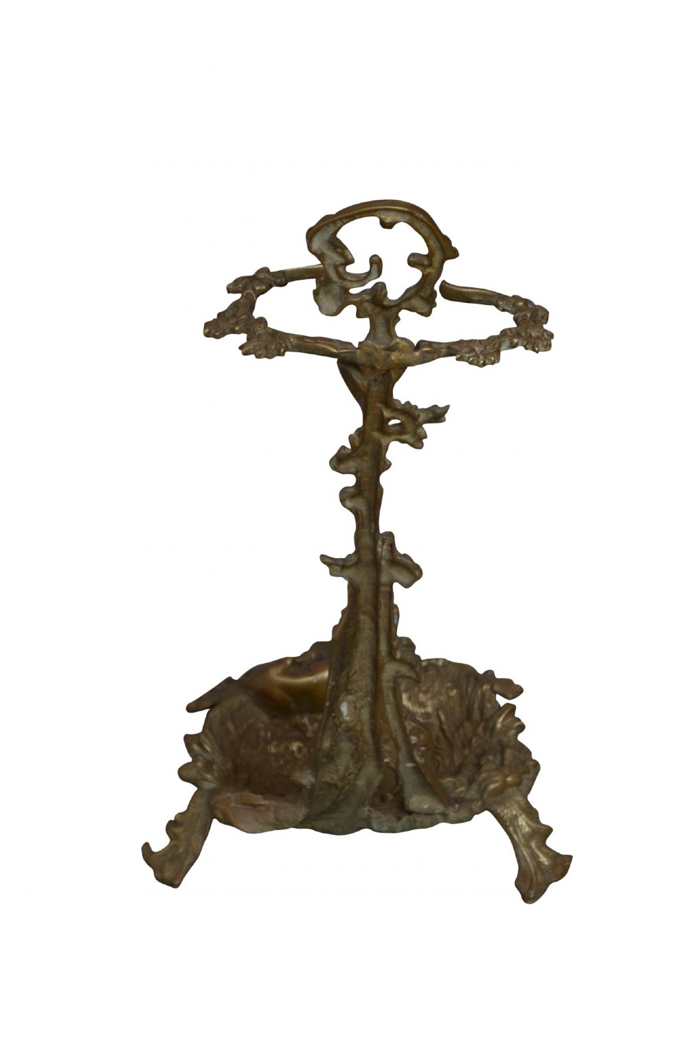 An antique cast brass stick stand featuring sporting motifs including a resting hound, rifle, game bag, and hunting horn. View VIII