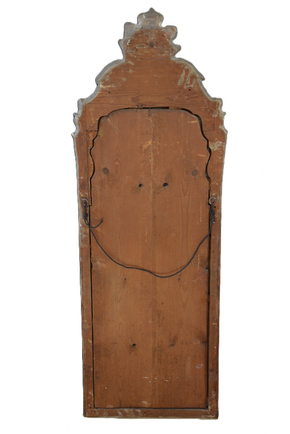 A tall, narrow Georgian giltwood pier mirror featuring a carved shell crest, scrollwork frame, and a split glass mirror plate. View VI