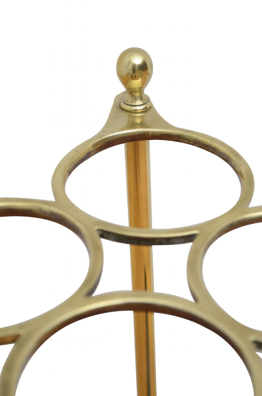 A Victorian brass umbrella stand featuring an eight-ring top frame, four tubular posts with ball finials, and a rectangular black cast iron drip tray. View III