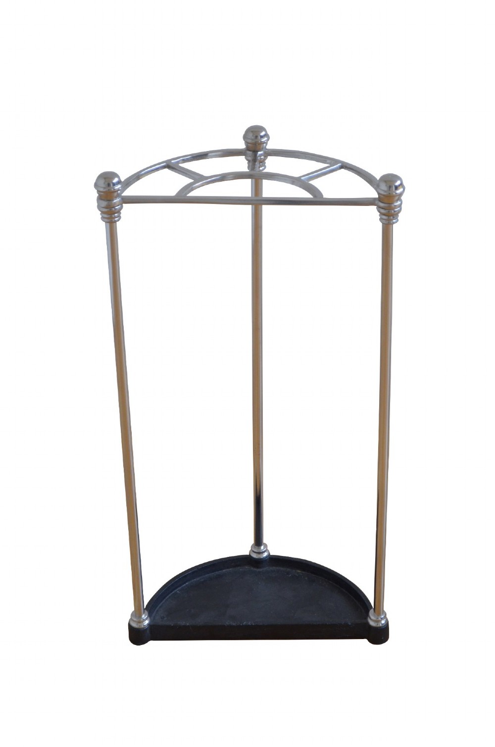 An Art Deco semi-circular nickel-plated umbrella stand featuring a fan-divided top section, three vertical support rods, and a black cast iron drip tray base. View II