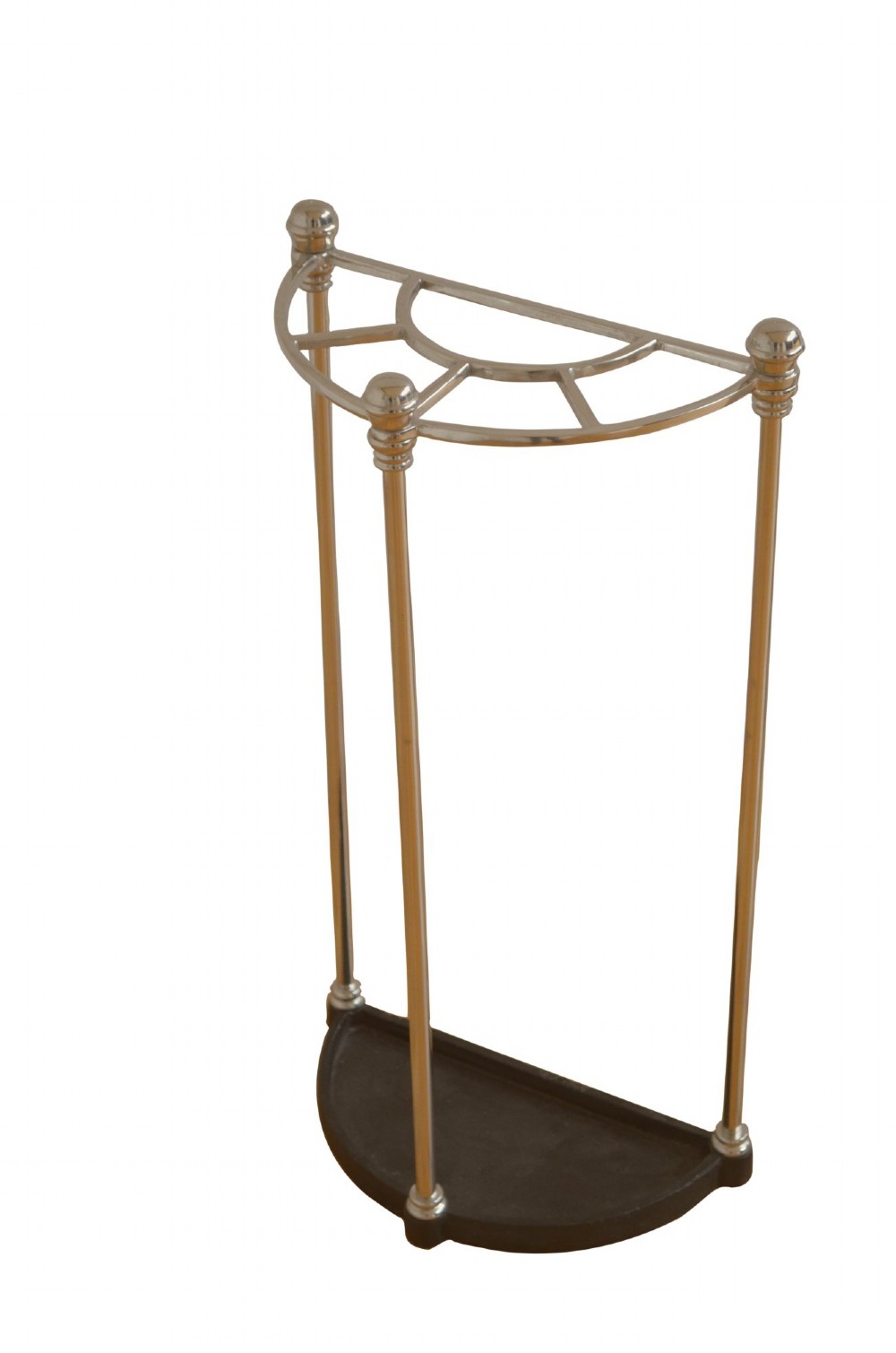 An Art Deco semi-circular nickel-plated umbrella stand featuring a fan-divided top section, three vertical support rods, and a black cast iron drip tray base. View III