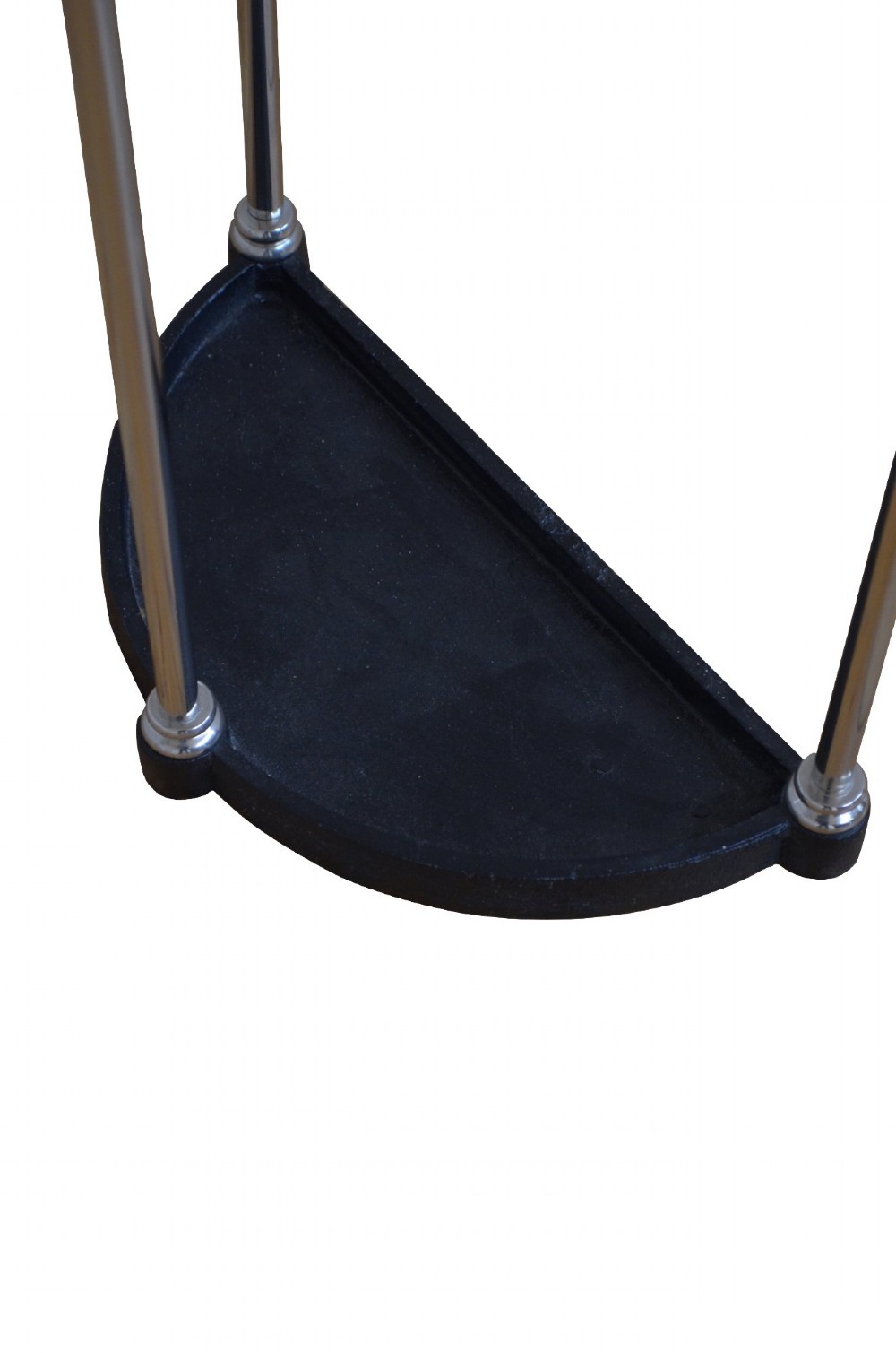 An Art Deco semi-circular nickel-plated umbrella stand featuring a fan-divided top section, three vertical support rods, and a black cast iron drip tray base. View VI