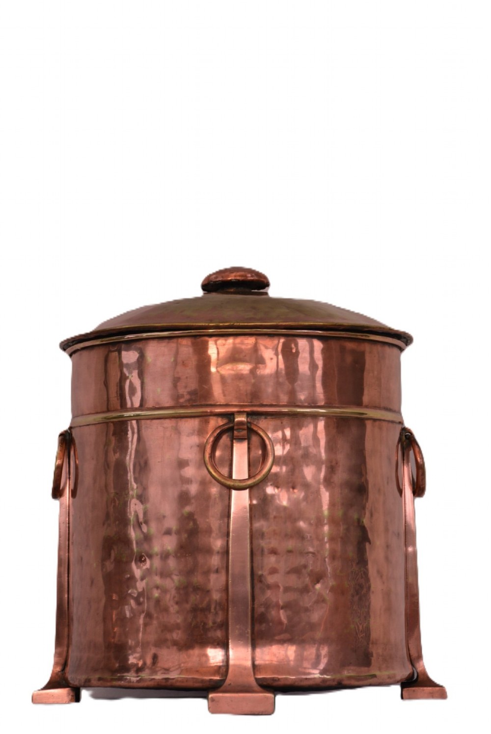 An Arts and Crafts hammered copper cylindrical coal bin featuring a fitted lid, drop side ring handles, structural legs, and a removable metal liner. View VI
