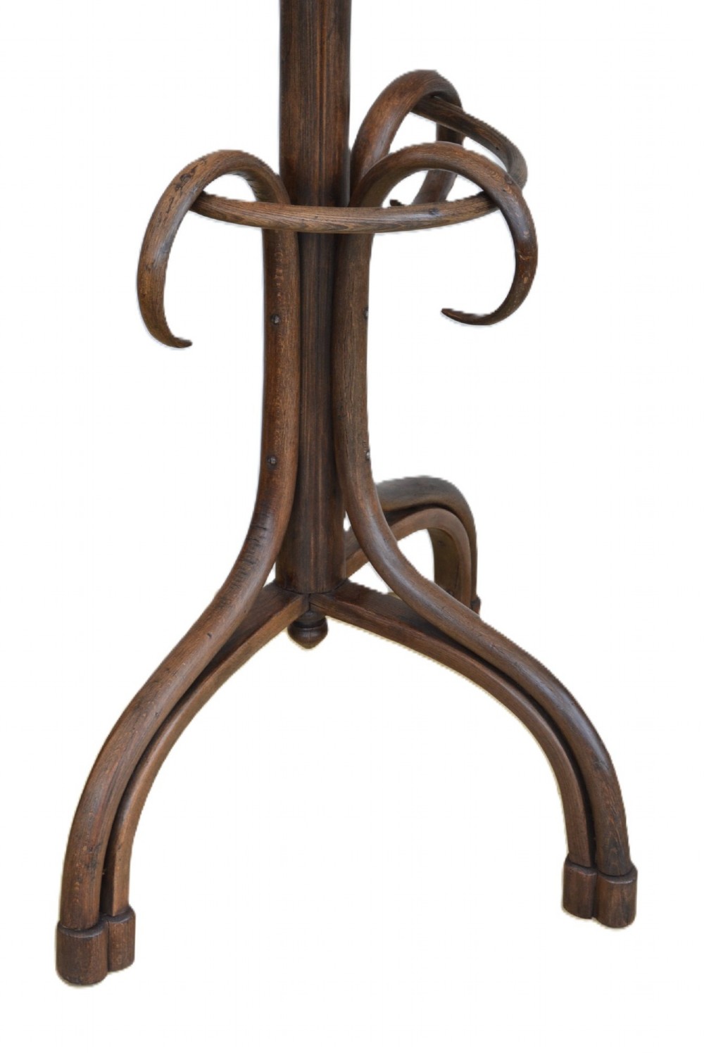 A dark brown free-standing bentwood coat stand featuring curved upper hooks, a central support shaft, and splayed legs with an integrated umbrella ring. View IV