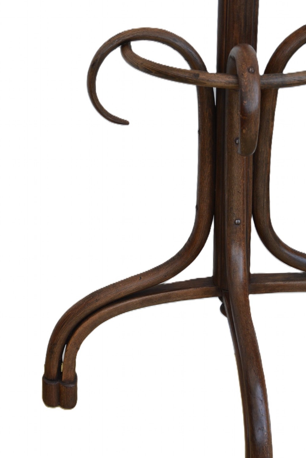 A dark brown free-standing bentwood coat stand featuring curved upper hooks, a central support shaft, and splayed legs with an integrated umbrella ring. View V