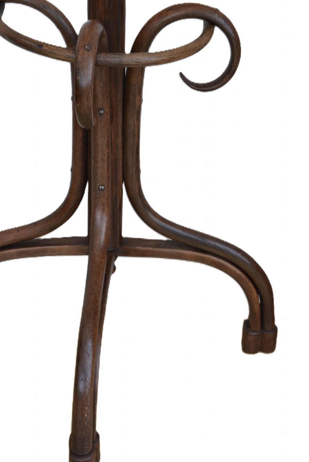 A dark brown free-standing bentwood coat stand featuring curved upper hooks, a central support shaft, and splayed legs with an integrated umbrella ring. View VI
