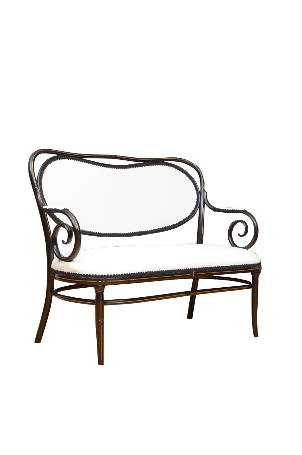 An ebonised bentwood armchair featuring white upholstered seat and back panels, scrolled armrests, and gold linear detailing on a black wooden frame. View VI