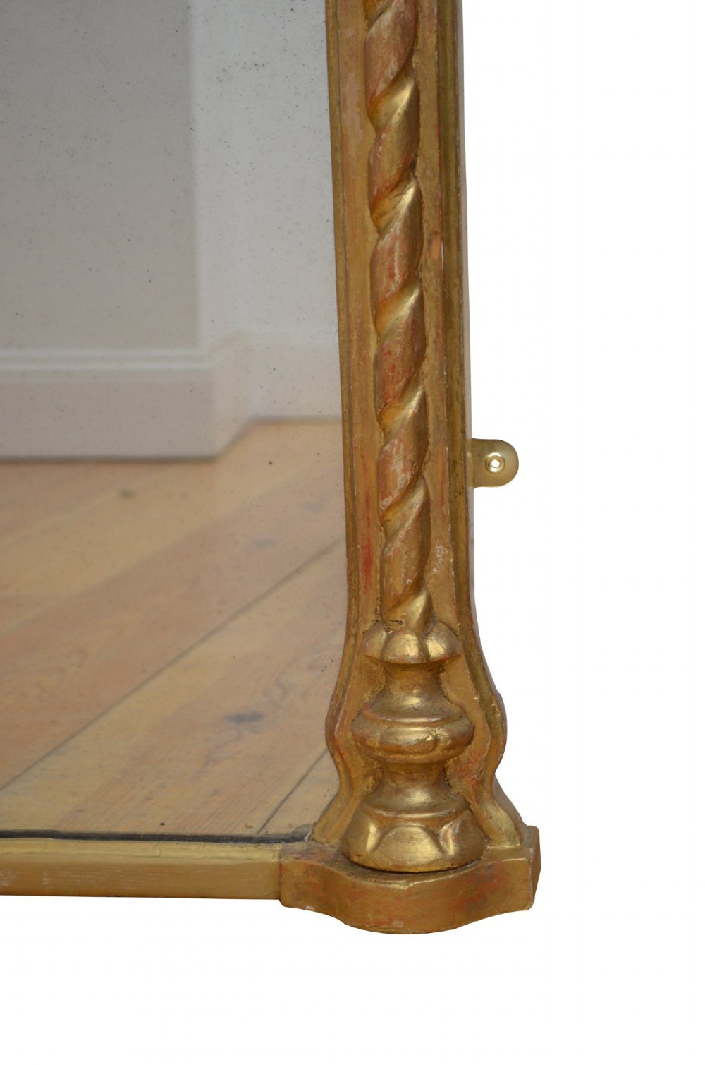 A tall nineteenth-century arched mirror featuring a gilded frame with a continuous carved rope twist motif. View III