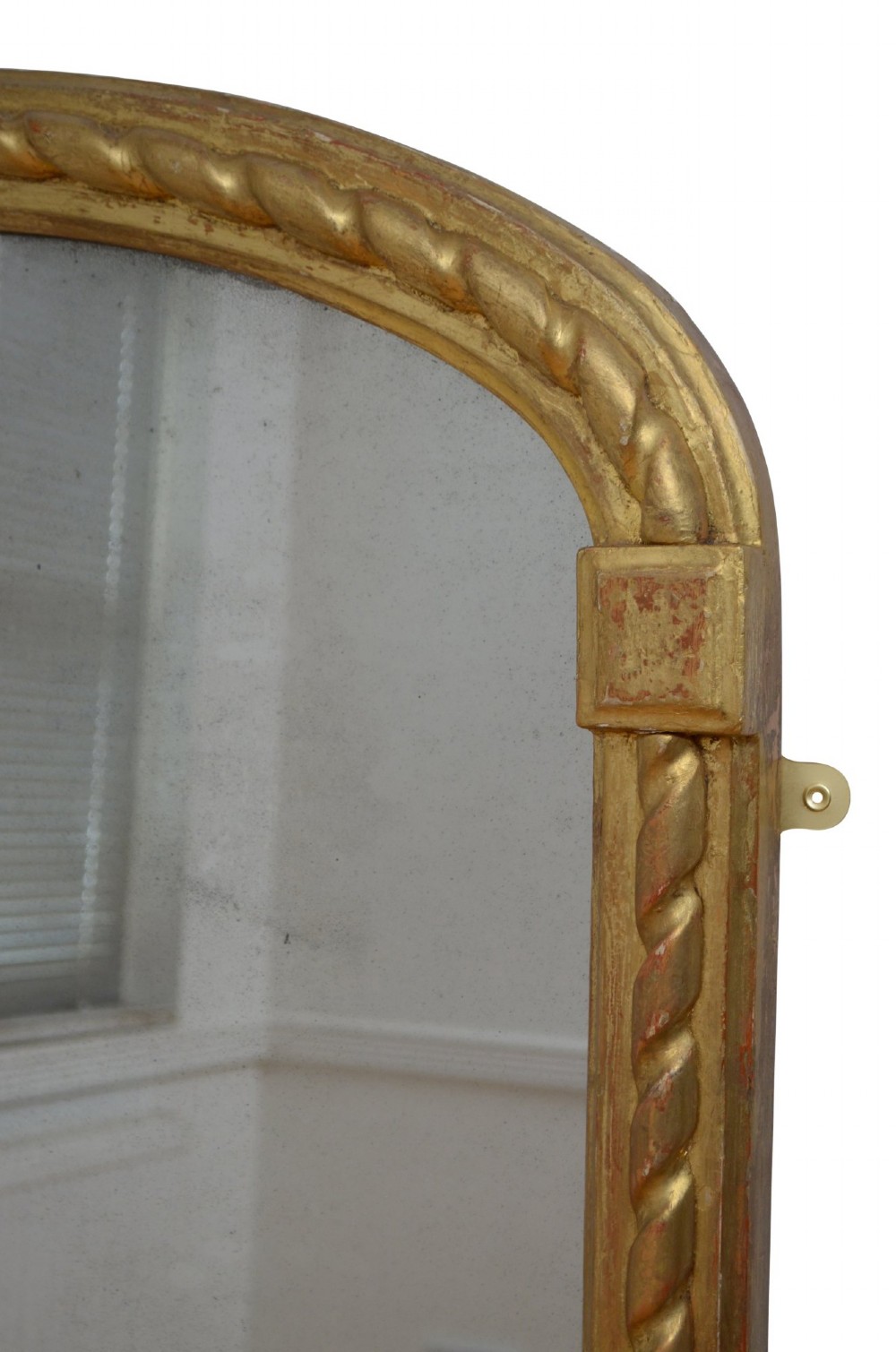 A tall nineteenth-century arched mirror featuring a gilded frame with a continuous carved rope twist motif. View XII
