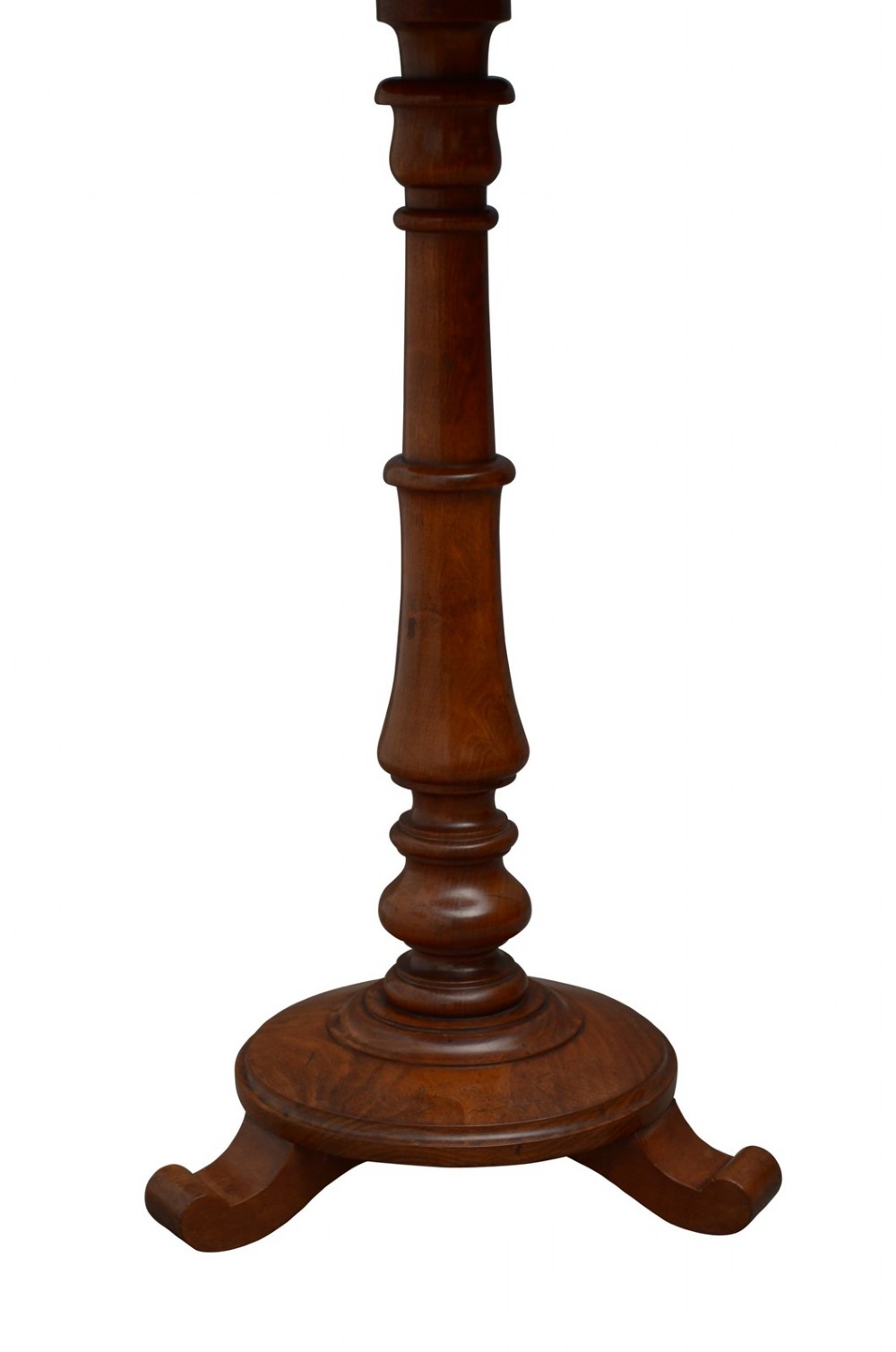 A William IV mahogany circular lamp table featuring a dark blue gilt-tooled leather inset top supported by a turned pedestal stem on a tri-form scroll-foot base. View VI
