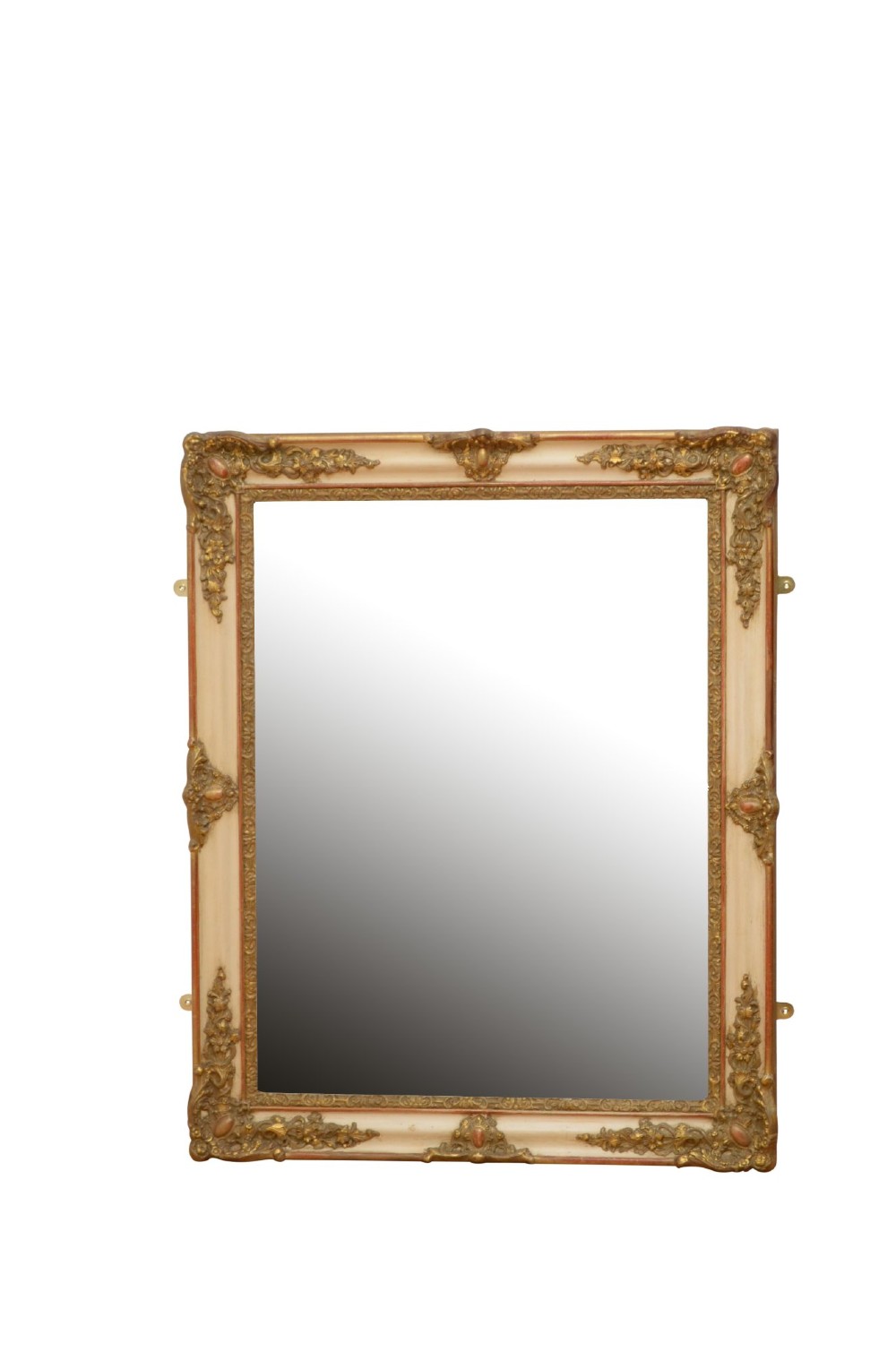 A rectangular 19th-century French Rococo wall mirror featuring an off-white frame decorated with ornate gold gilt gesso scrollwork and corner cartouches surrounding an aged glass plate. View IV