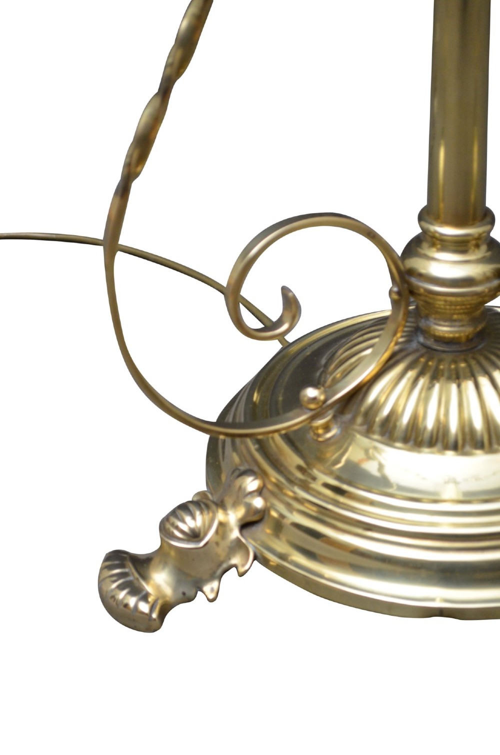 An antique Arts and Crafts brass standard floor lamp featuring a flared fabric shade, a height-adjustable central stem, scrollwork details, and a stepped circular base. View V