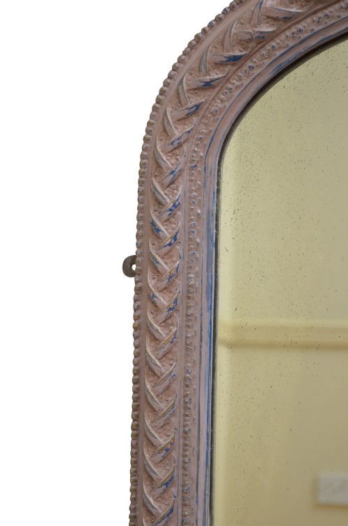 An arched French overmantel mirror featuring a carved wooden frame with a layered lilac and blue painted finish. View VI
