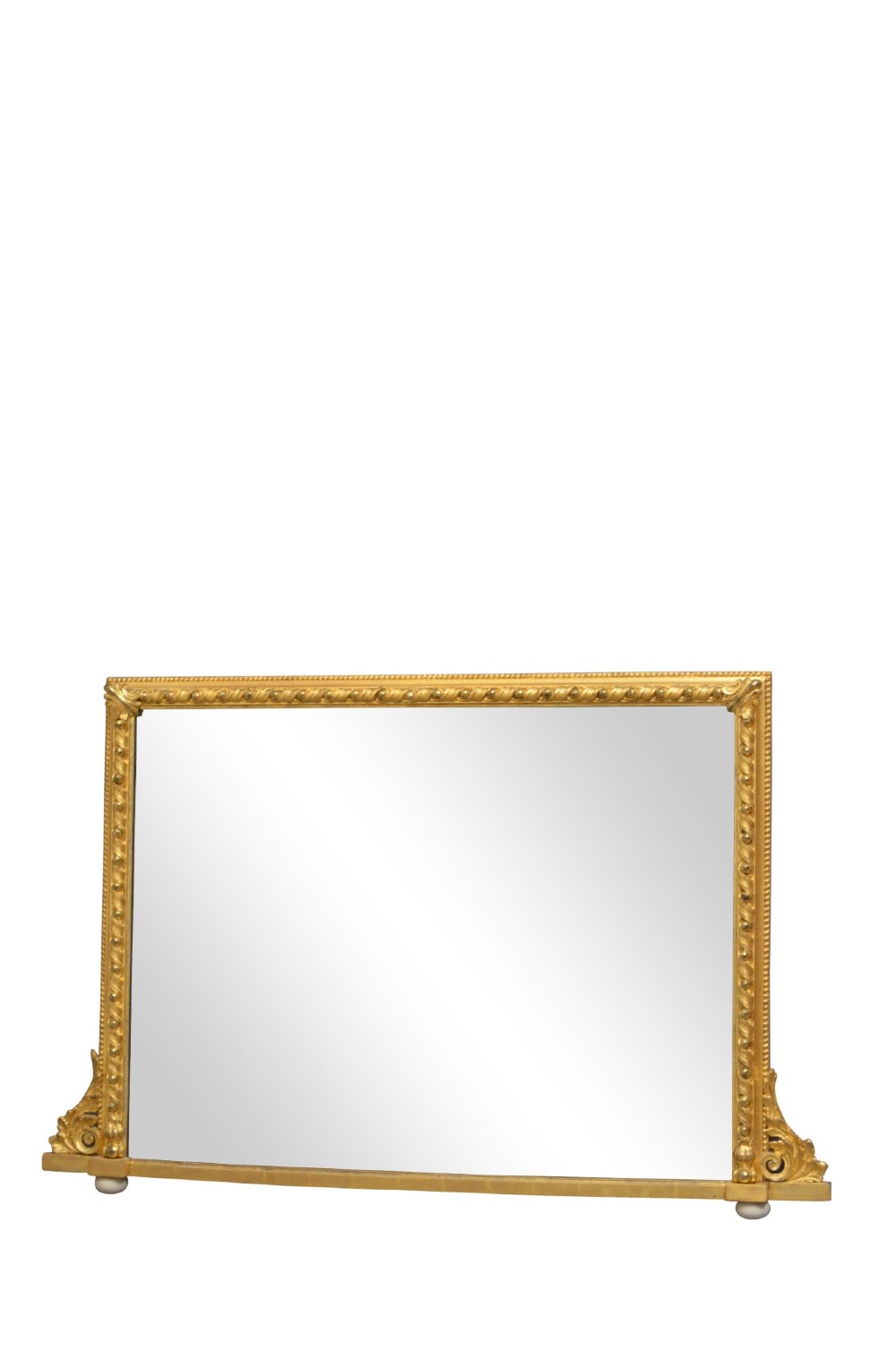 A rectangular Victorian giltwood overmantel mirror with carved rope twist moulding, corner scroll details, and original mirror glass.