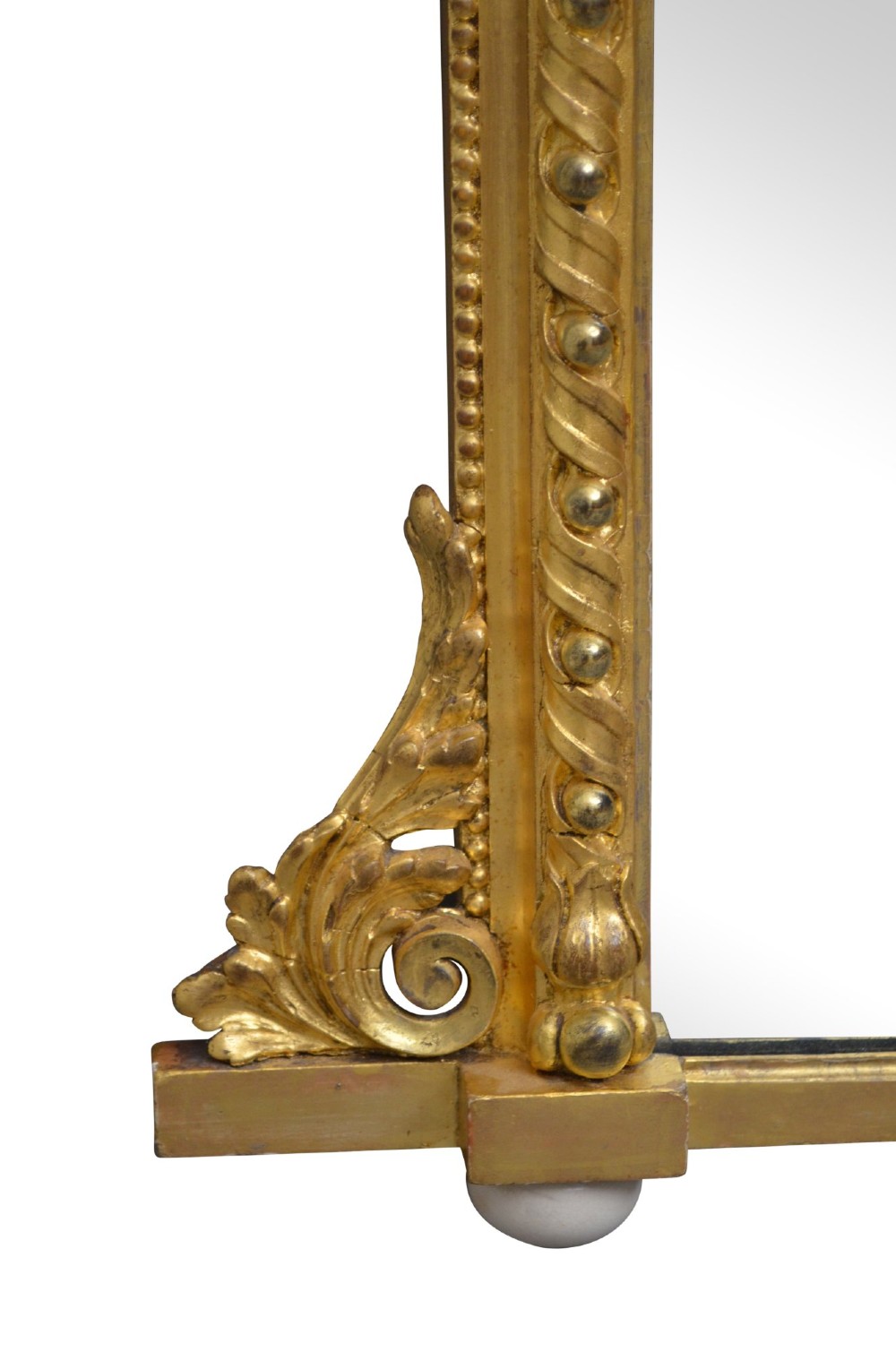 A rectangular Victorian giltwood overmantel mirror with carved rope twist moulding, corner scroll details, and original mirror glass. View II