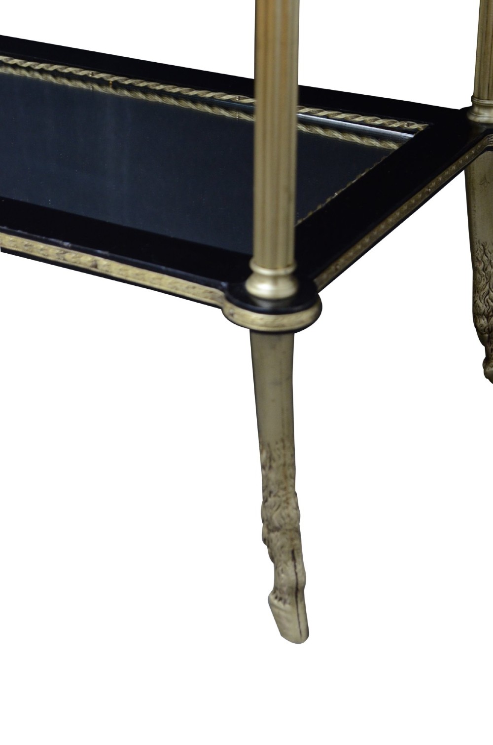 A late nineteenth-century French three-tier lamp table featuring a marquetry inlaid top with foliage border, slender brass columnar supports, two lower mirrored shelves, and brass hoof feet. View II