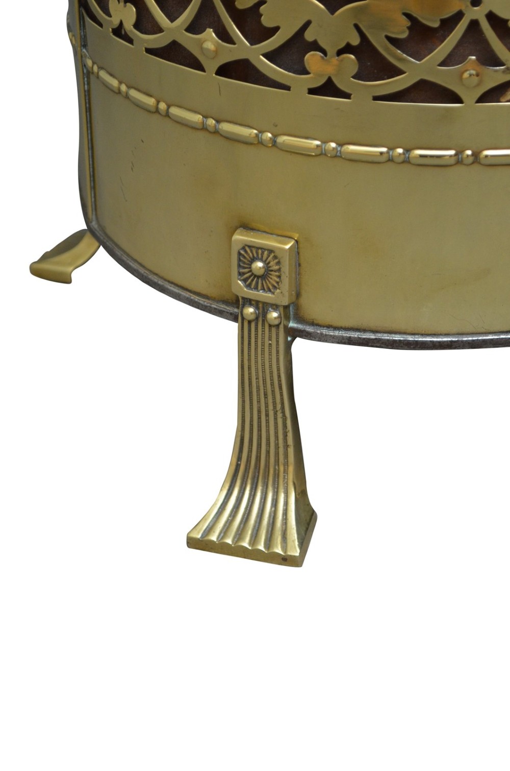 A cylindrical Edwardian polished brass coal bucket featuring a fretwork band, domed lid with finial, and three cast fluted feet. View VIII