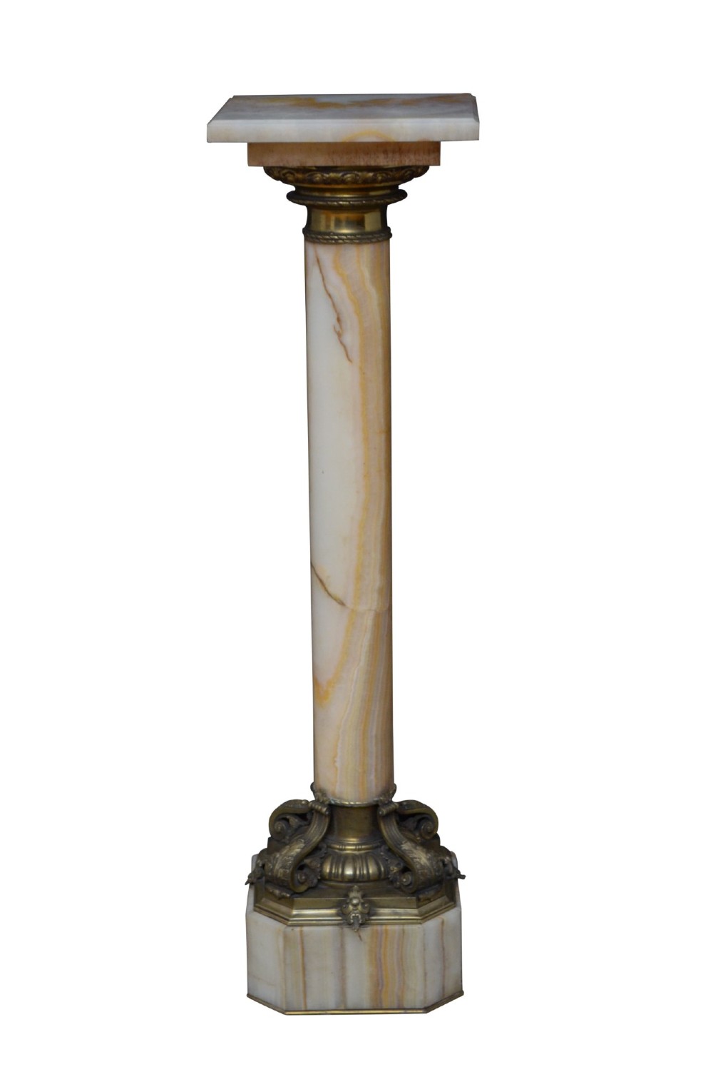 A tall cylindrical cream and amber onyx column featuring gilt bronze ormolu mounts at the top and base, set on a square plinth. View III