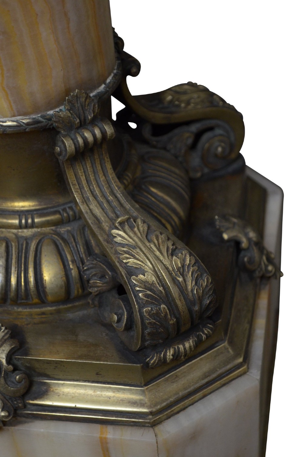 A tall cylindrical cream and amber onyx column featuring gilt bronze ormolu mounts at the top and base, set on a square plinth. View X