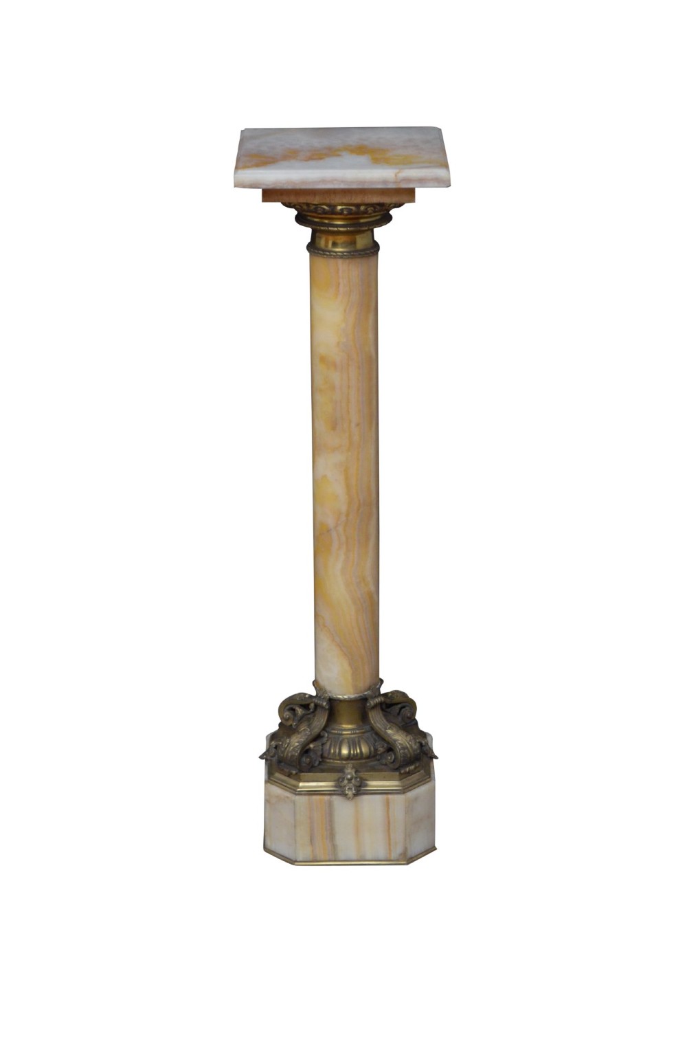 A tall cylindrical cream and amber onyx column featuring gilt bronze ormolu mounts at the top and base, set on a square plinth. View II