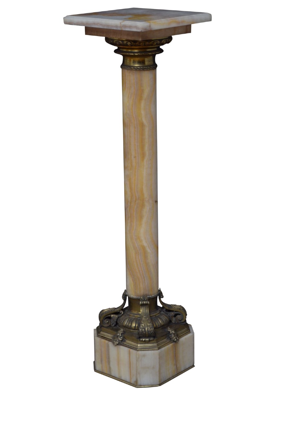 A tall cylindrical cream and amber onyx column featuring gilt bronze ormolu mounts at the top and base, set on a square plinth. View XIII