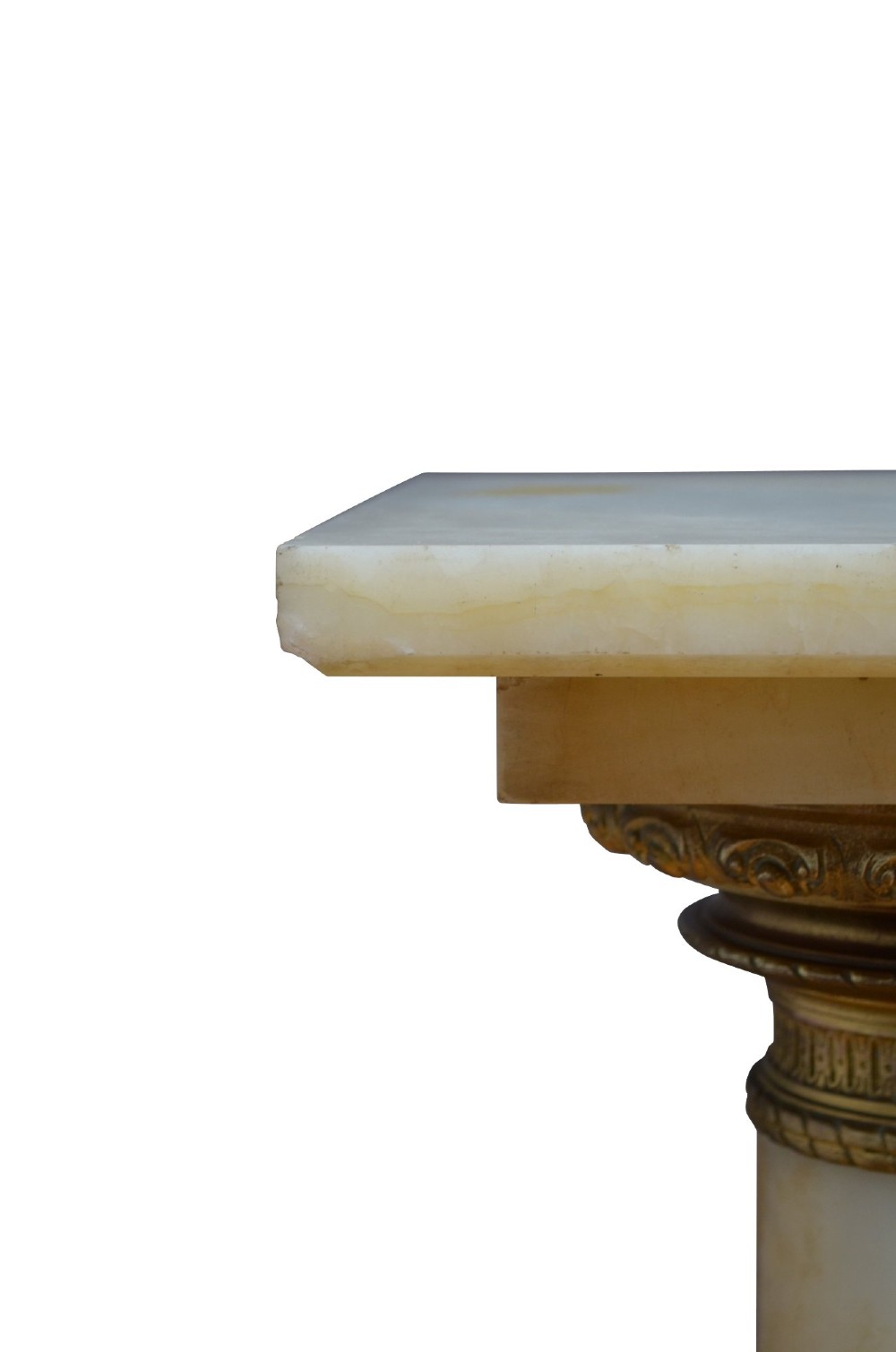 A pair of tall cylindrical onyx marble pedestals with square top plinths and ornate gilt ormolu collars and bases. View VI