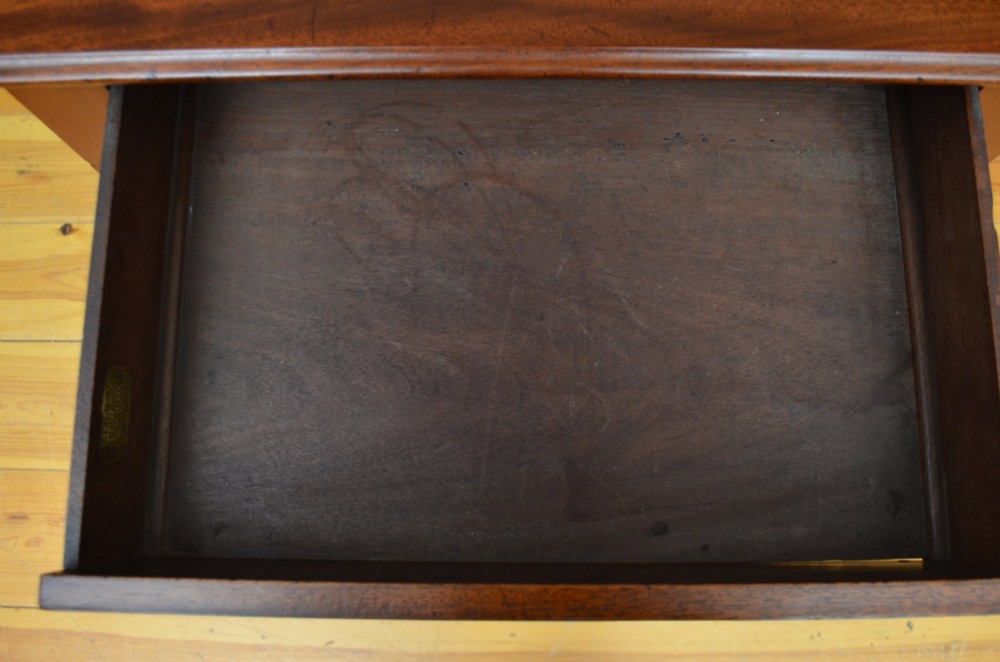 A narrow antique mahogany console table featuring turned legs and a polished timber top against a plain white background. View VII