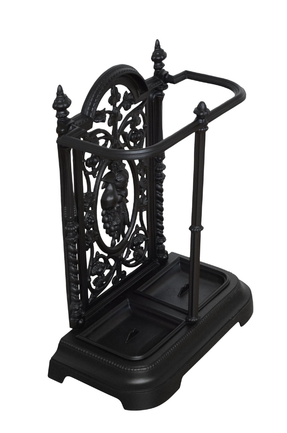 A black cast iron umbrella stand featuring an ornate foliate backplate, top support rail, and a twin-section drip tray at the base. View V