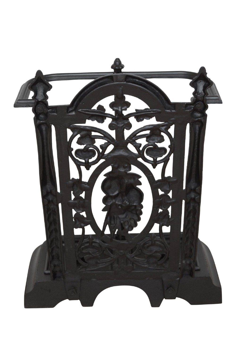 A black cast iron umbrella stand featuring an ornate foliate backplate, top support rail, and a twin-section drip tray at the base. View IX