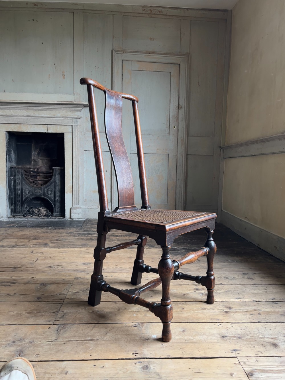 A Queen Anne period walnut caned 