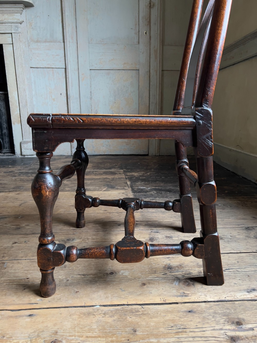 A Queen Anne period walnut caned 