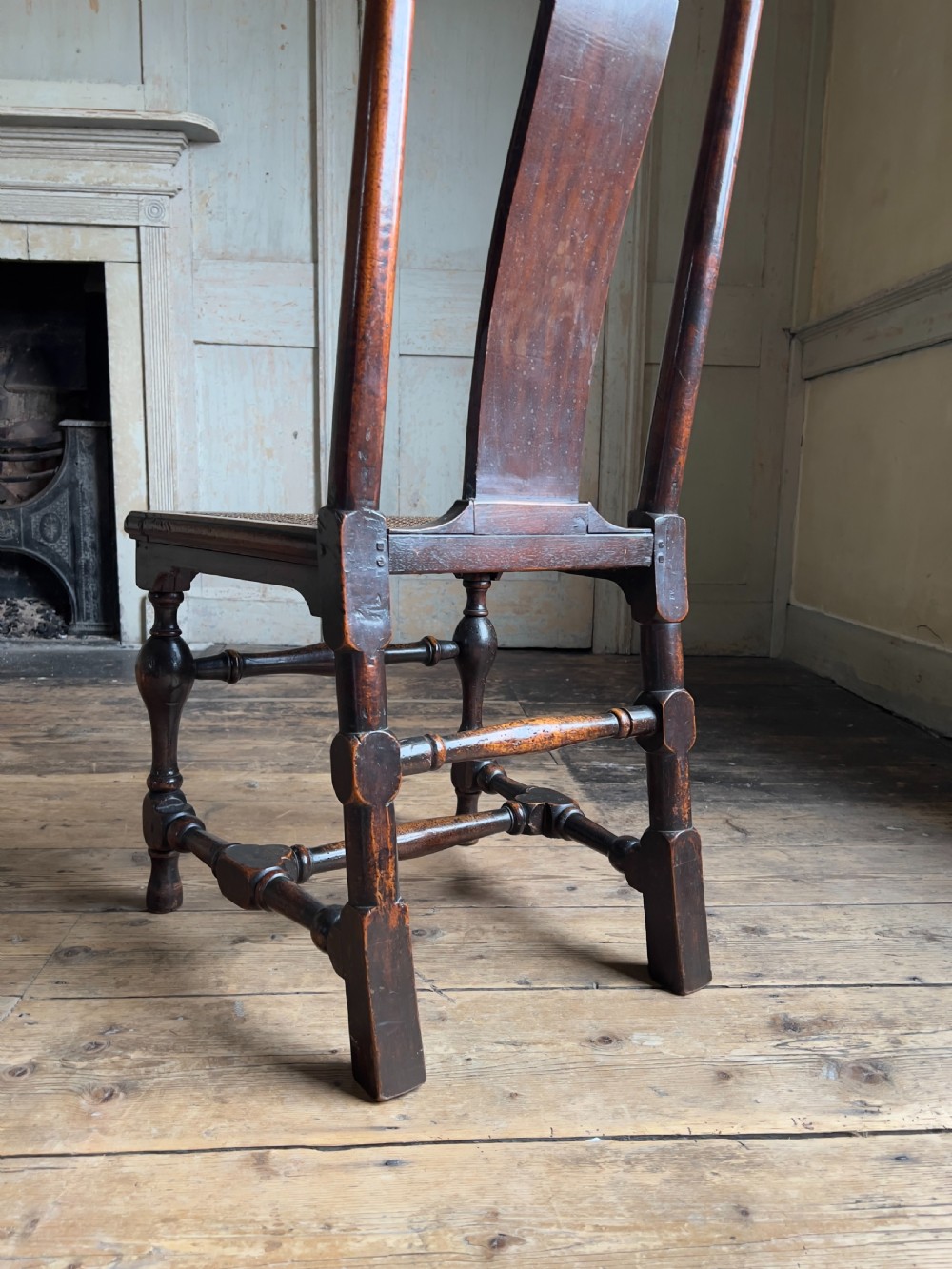 A Queen Anne period walnut caned 