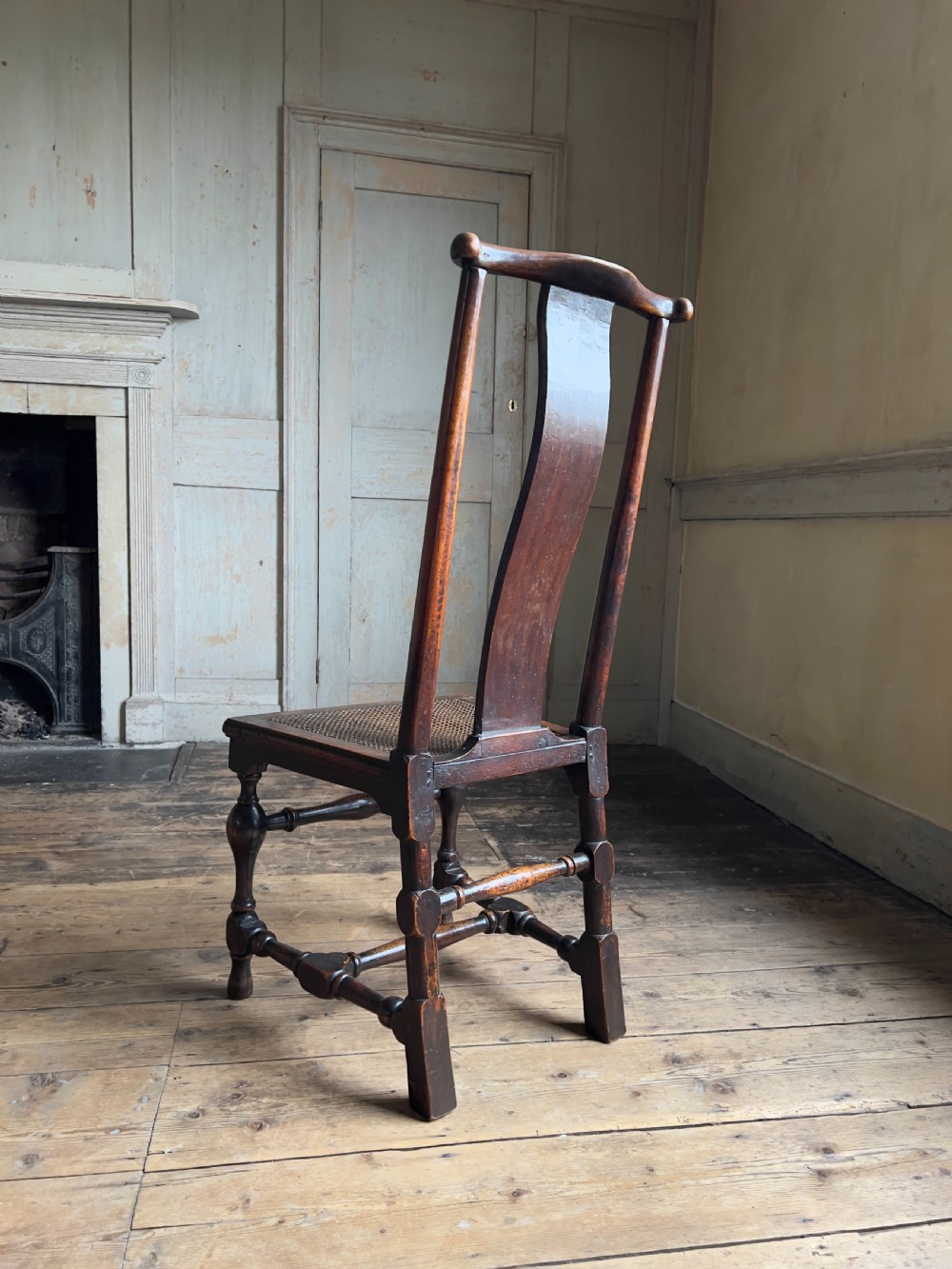 A Queen Anne period walnut caned 