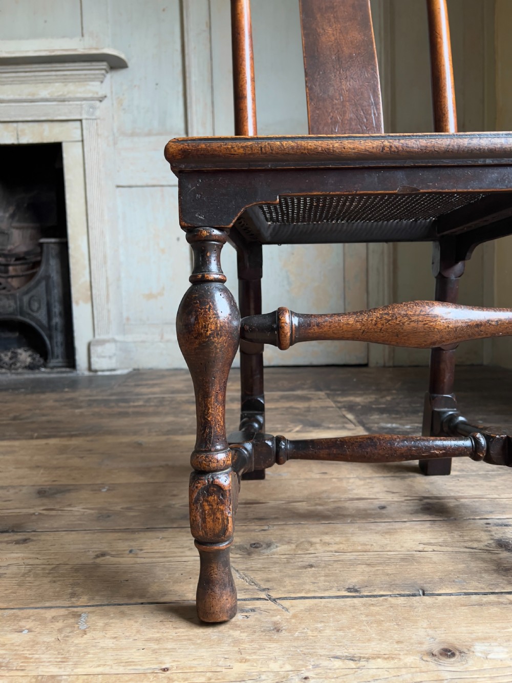 A Queen Anne period walnut caned 