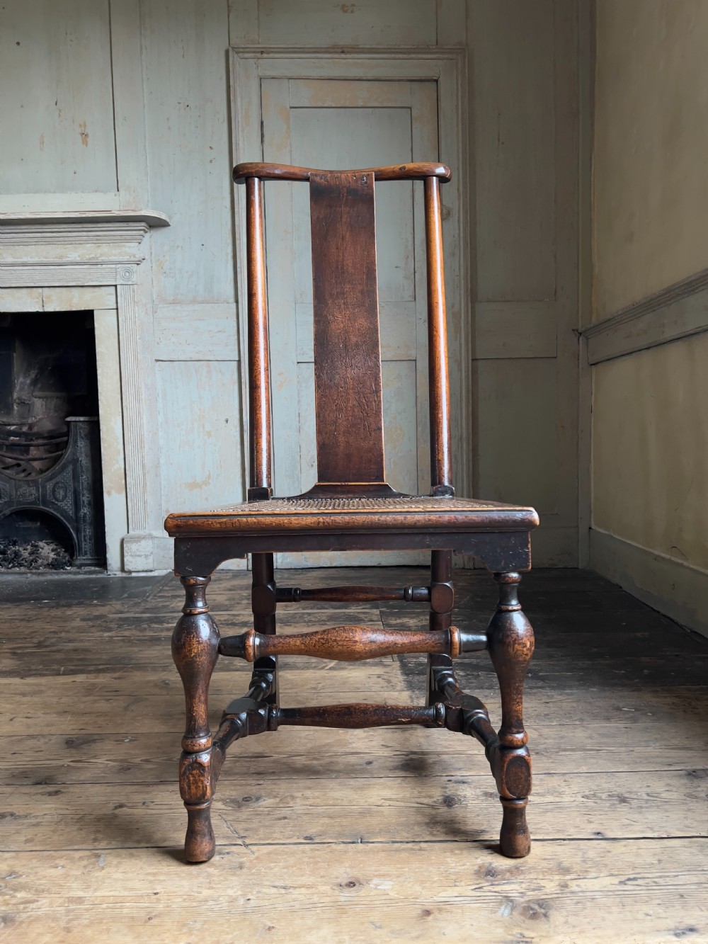 A Queen Anne period walnut caned 