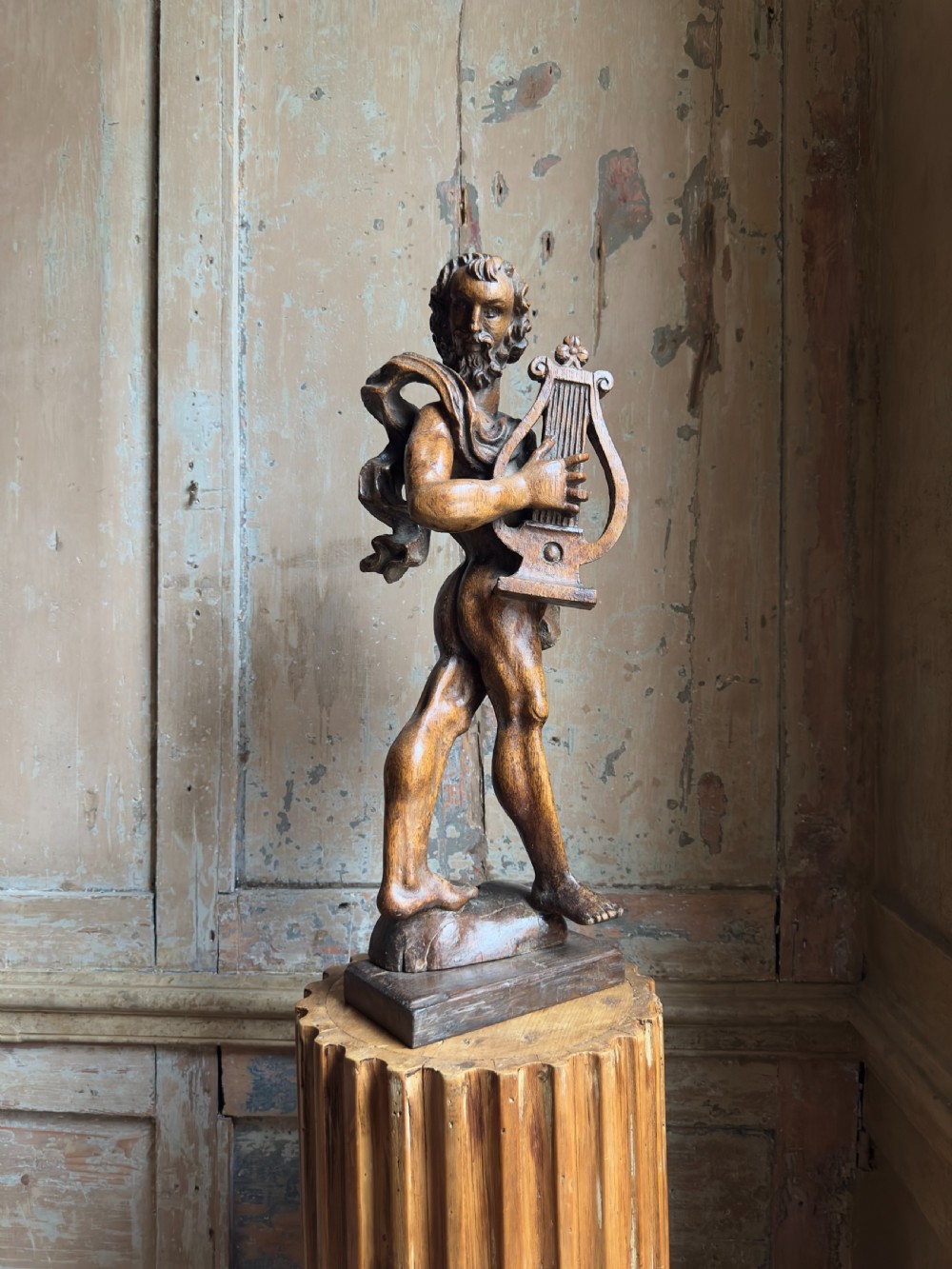 A rare 17th century carved oak figure of Orpheus View V