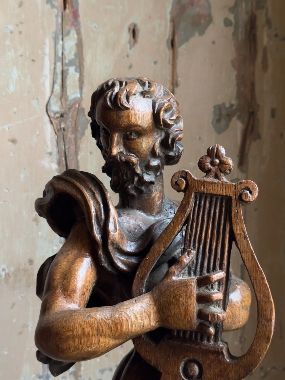 A rare 17th century carved oak figure of Orpheus View VIII