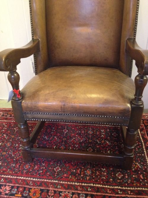 fig 1. HEAVY OAK LEATHER STUDDED WING ARMCHAIR