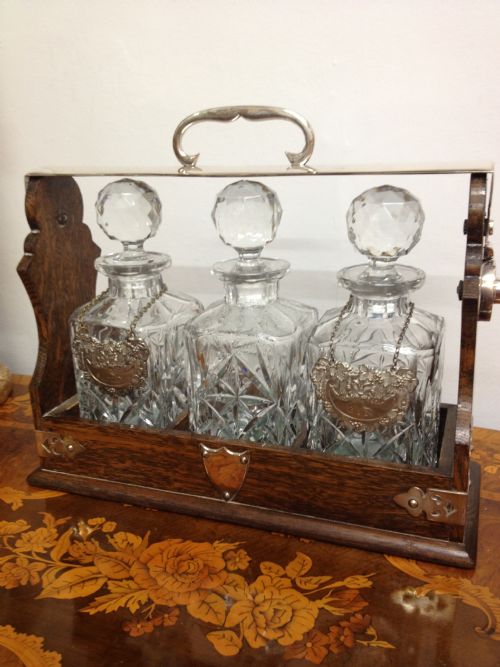 OAK AND SILVER PLATED 3 BOTTLE TANTALUS View IV